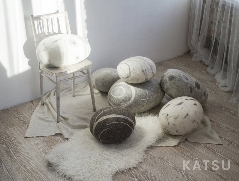 Zen She Shed Interiors Felt stone poufs or pillows. Made of soft natural wool. Like real rocks. KATSU is a stone-like wool ottomans, pillows and poufs.